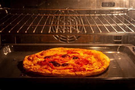 The Best Temperature To Reheat Pizza: Oven, Air Fryer, Microwave & More ...