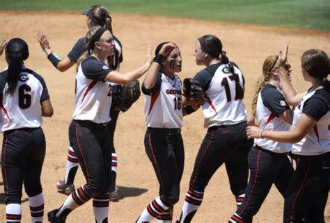 the georgia team celebrates after a win against western kentucky ...