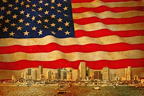 Downtown Miami skyline blended with the US flag waving on old paper ...