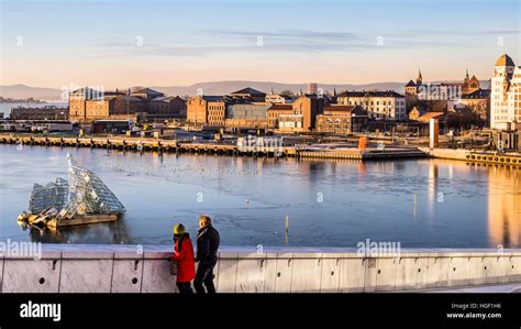 Watching the sunset with skyline view from the Opera House, Oslo Stock ...