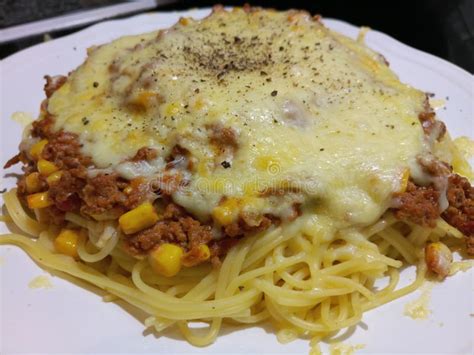 Spaghetti Bolognese Covered in Melted Cheese Stock Photo - Image of ...