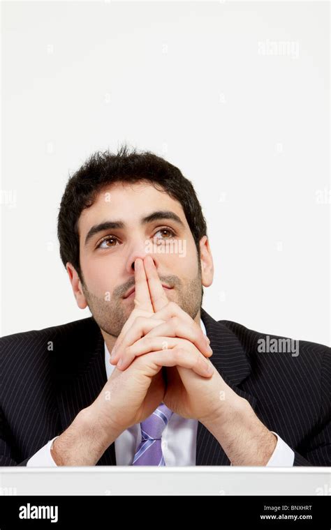 Stressed business man working in office with laptop Stock Photo - Alamy