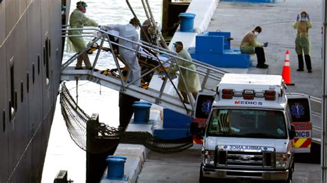 Passengers on coronavirus-stricken cruise ships disembark in Florida ...