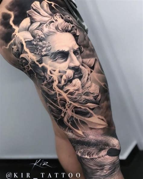 a man's arm with an image of the greek god and lightning coming out of ...