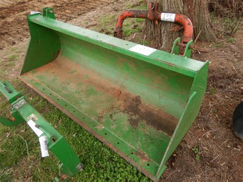 FRONT LOADER BUCKET - J.M. Wood Auction Company, Inc.