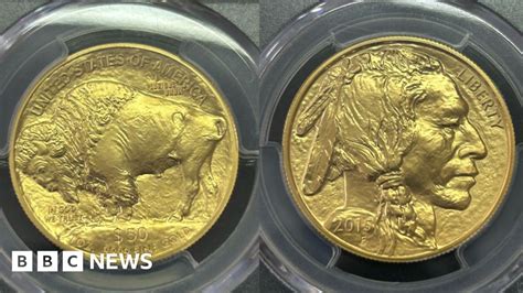 Solid gold coin found in charity collection can