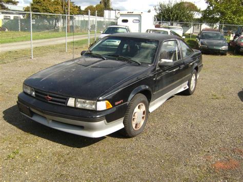 Dueling Horsemen: 1985 Chevy Cavalier Convertible vs 1990 Chevy ...