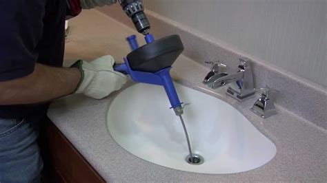 To Use A Drain Snake On Kitchen Sink / How to Work a Snake for a Clog ...