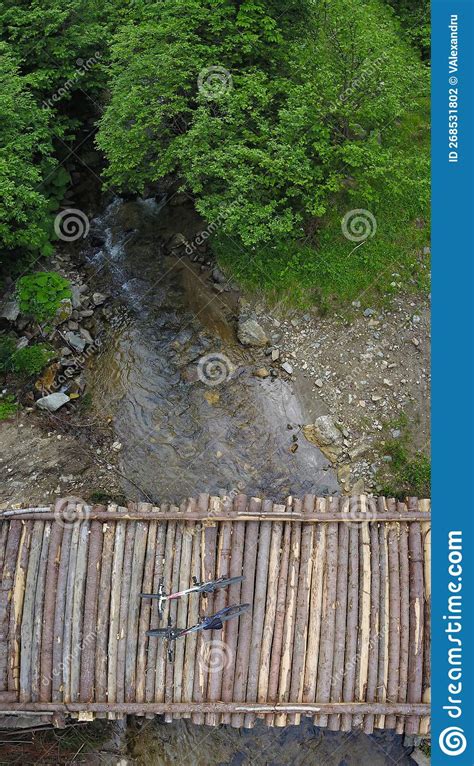 Bicycles on a bridge stock photo. Image of watercourse - 268531802