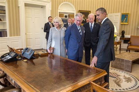 President Obama shows the Resolute Desk to Charles, Prince of Wales and ...