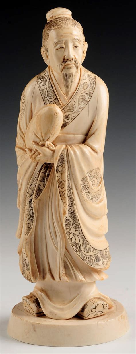 #395: AN ANTIQUE CHINESE CARVED IVORY FIGURE