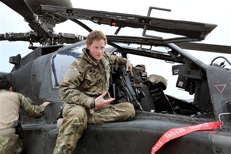 Britain's Prince Harry returns from deployment as helicopter pilot in ...