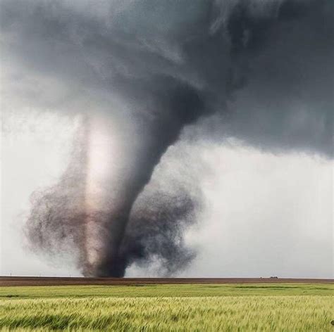 A Tornado from a supercell thunderstorm over a pristine farm by Brett ...