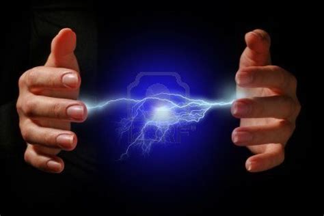 Hands and electric discharge over black background. | Energy, Easy ...