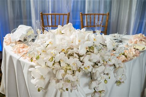 White orchid centerpiece | White orchid centerpiece, Orchid ...