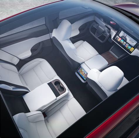 Tesla unveils new Model S with new interior, crazy steering wheel, and ...