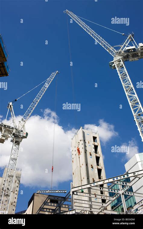 cranes on construction site Stock Photo - Alamy