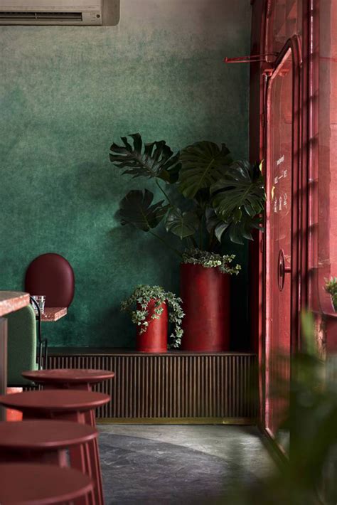 Red5studio built cafe evoking a retro spirit with hues of red colors ...