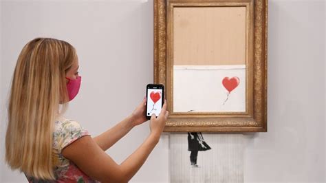 Banksy's half shredded artwork sells for record amount - BBC Newsround