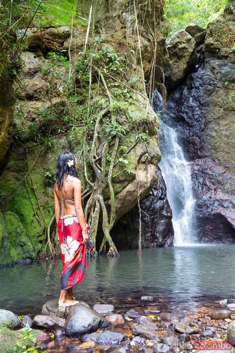 - Tourist in front of waterfall in a tropical island, Fiji | Royalty ...