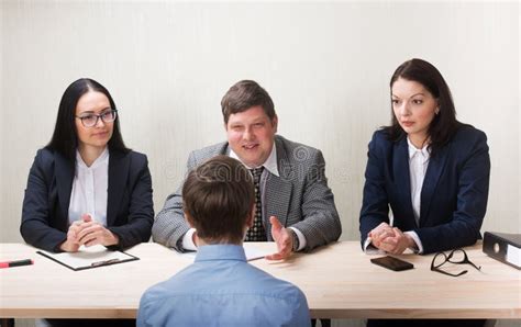 Young Man during Job Interview and Members of Managemen Stock Photo ...