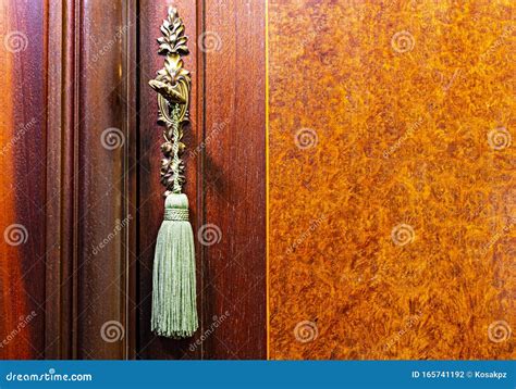 Key in a closet lock stock photo. Image of lock, tassel - 165741192