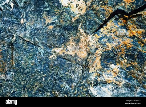 Natural Surface texture of serpentinite. Background with green mineral ...