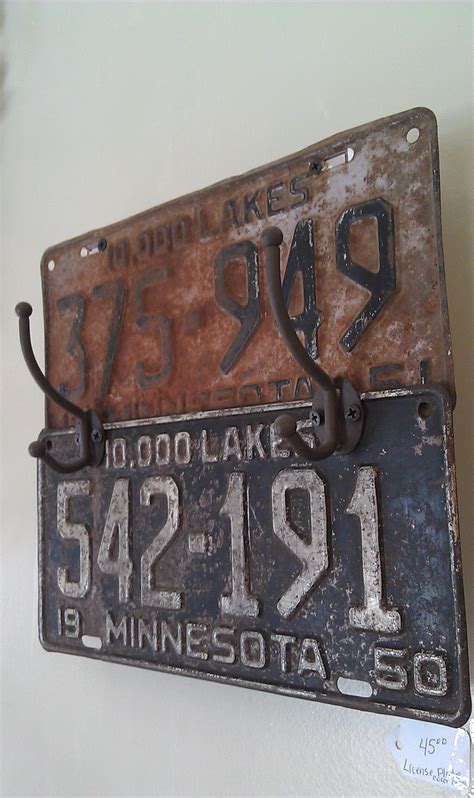 Rusty vintage license plates made into a coat rack | License plate ...