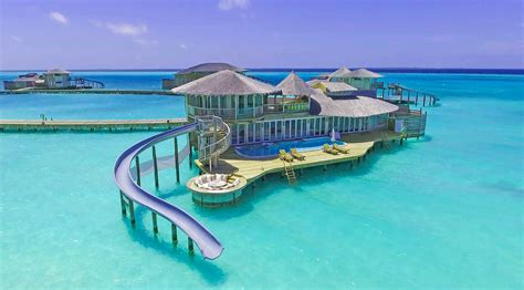 These villas in the Maldives have slides that take you right into the water