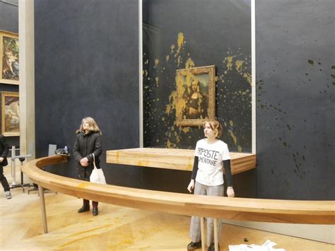 Mona Lisa splattered in soup at Louvre Museum in Paris by food protesters