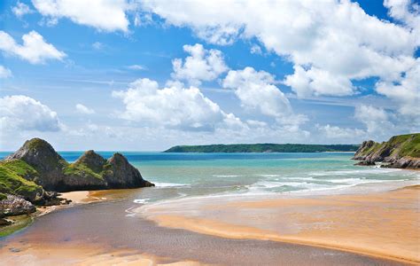 The Welsh beach at Three Cliffs Bay, on the Gower Peninsula, is wild ...