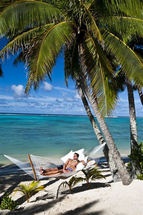 Little Polynesian Resort - Couple on Hammock - Pacific Resort Hotel Group