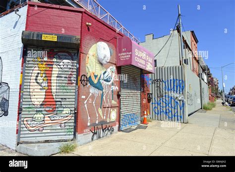 Graffiti shown on a city street Stock Photo - Alamy