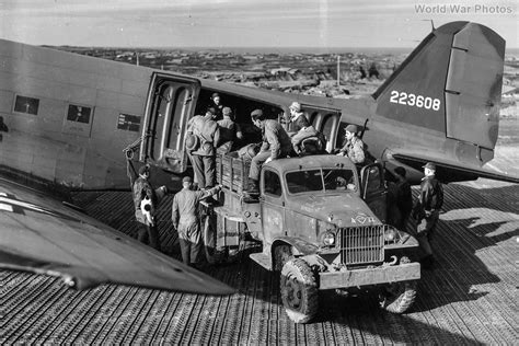 C-47A 42-23608 being unloaded at Amchitka Island 1943 | World War Photos