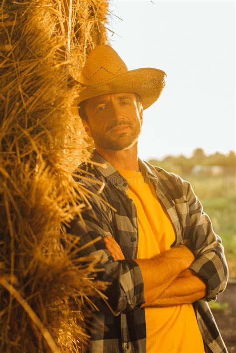 Rancher in Shirt and Straw Hat Stock Photo - Image of rancher, outdoors ...