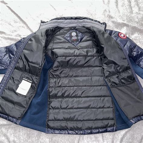 Canada goose hybridge light jacket in navy blue size... - Depop