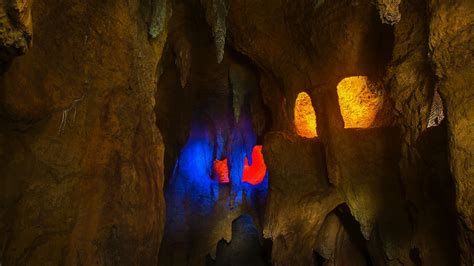 A rocky and dark cavern inside Injun Joe's Cave on Tom Sawyer Island