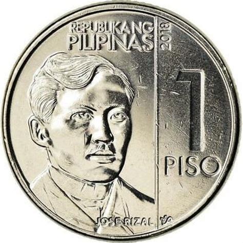 the back side of a 1 piso coin, with an image of a man's face on it