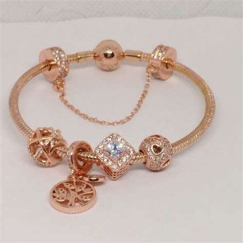 Pandora rose gold bracelet with 5 pandora rose gold charms set size 7.1 ...