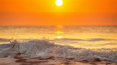 Ocean Waves In Orange Yellow Sky Background During Sunrise 4K HD Ocean ...