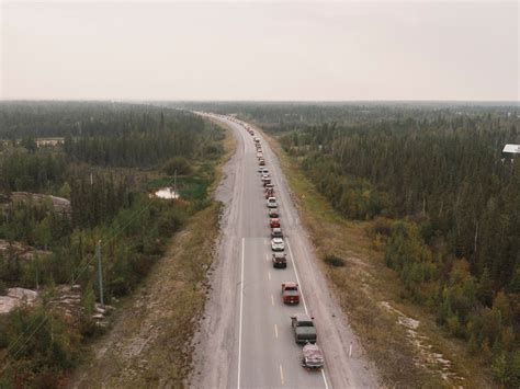 Out-of-control wildfires in Yellowknife, Canada, force 20,000 residents ...