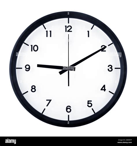 Classic analog clock pointing at nine ten, isolated on white background ...