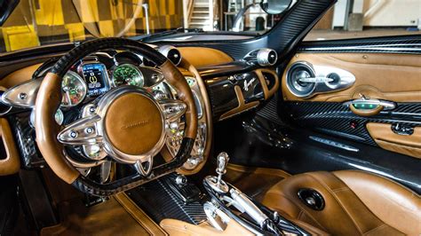 Download Pagani Huayra Brown-Black Interior Wallpaper | Wallpapers.com