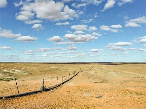 Image of Rabbit proof fence in outback South Australia - Austockphoto