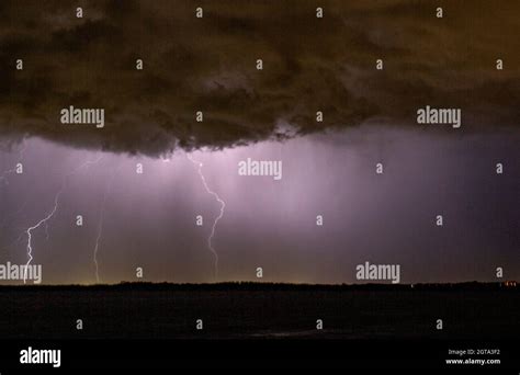 Common cloud to ground lightning strike Stock Photo - Alamy