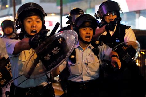 Hong Kong police draw guns in latest protest violence | PBS News Weekend