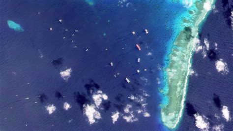 Chinese militia warships back in force at Whitsun Reef