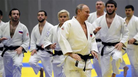 Putin demonstrates black belt judo skills