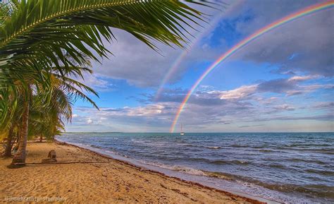 Catching a double rainbow sunset while in Hopkins, Belize