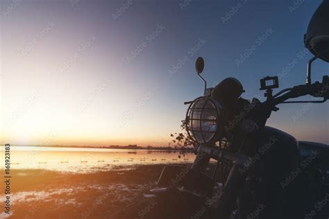 Silhouette of motorcycle with sunset background Stock Photo | Adobe Stock